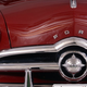 Illustration for article titled This Is Why Many Old Fords Had Badges With Three Cats On Them